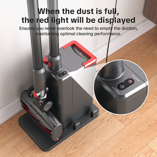 Vacuum cleaner with red light indicator on a wooden floor